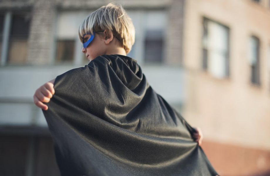 A child portraying a superhero.